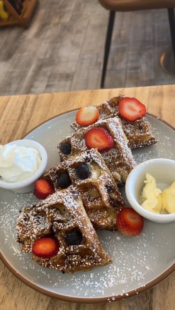 Berry waffles with whipped cream at GiLei's Café